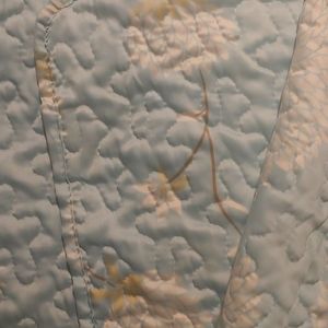 Quilted coverlet and matching envelope pillowcases